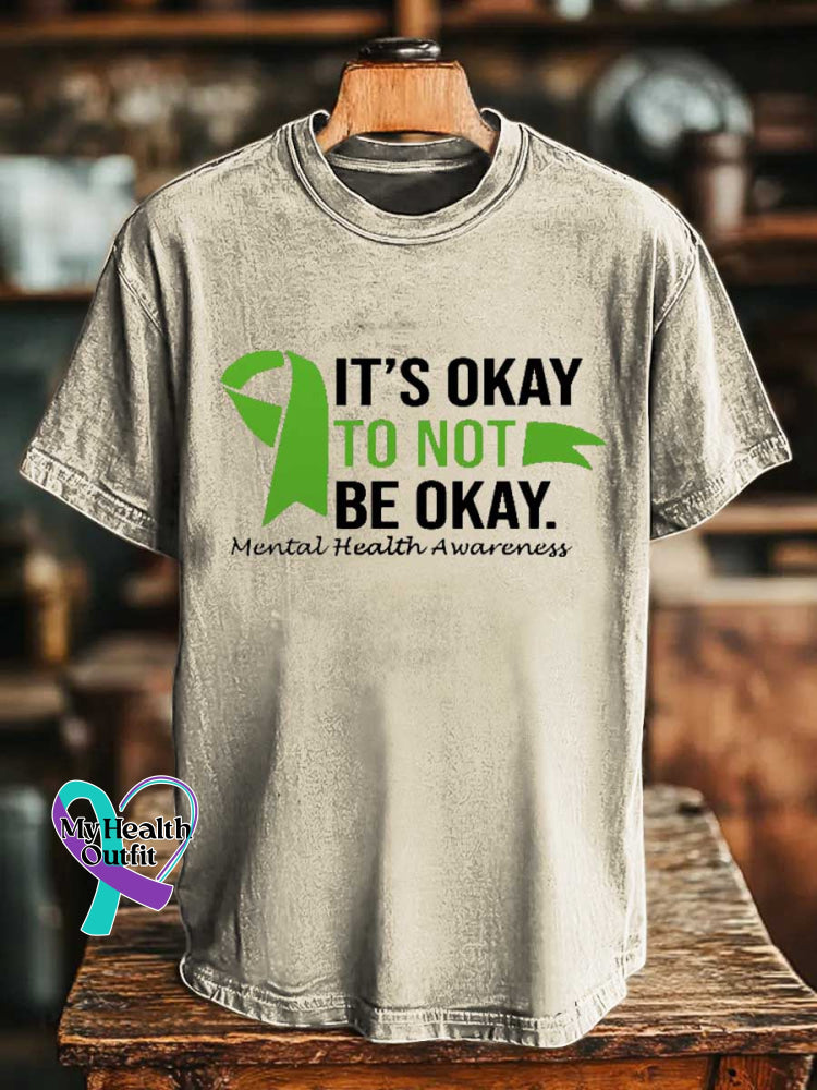 IT’S OKAY TO NOT BE OKAY. Mental Health Awareness T-shirt Sand / S