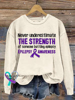 Never Underestimate The Strength Of Someone Batting Epilepsy Epilepsy Awareness Crew Neck Sweatshirt Beige / S