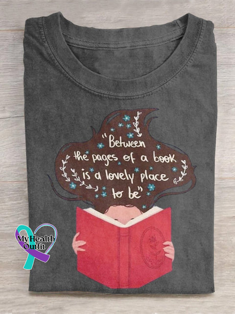 ’Between The Pages Of A Book Is Lovely Place To Be’ Lover Graphic Printed T-Shirt Grey / S