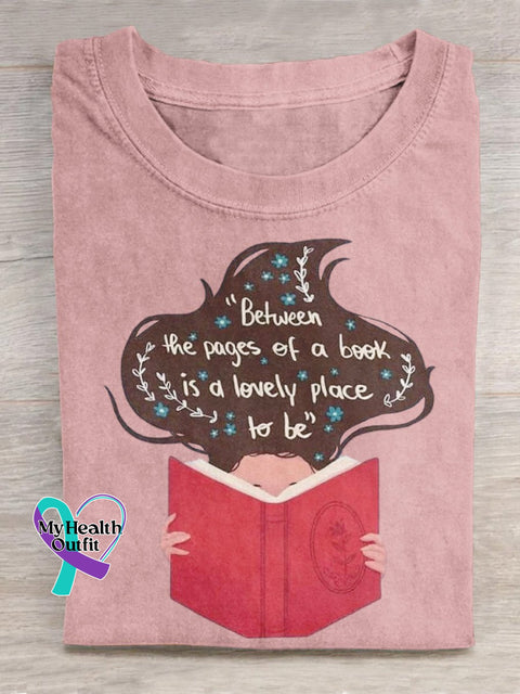 ’Between The Pages Of A Book Is Lovely Place To Be’ Lover Graphic Printed T-Shirt Pink / S