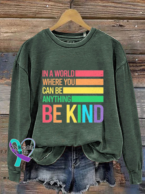 In A World Where You Can Be Anything Kind Art Print T-Shirt Green / S