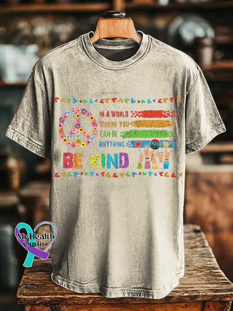 IN A WORLD WHERE YOU CAN BE ANYTHING BE KIND Peace Sign T-shirt Sand / S