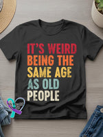 It’s Weird Funny Saying Art Print T-shirt Black / S