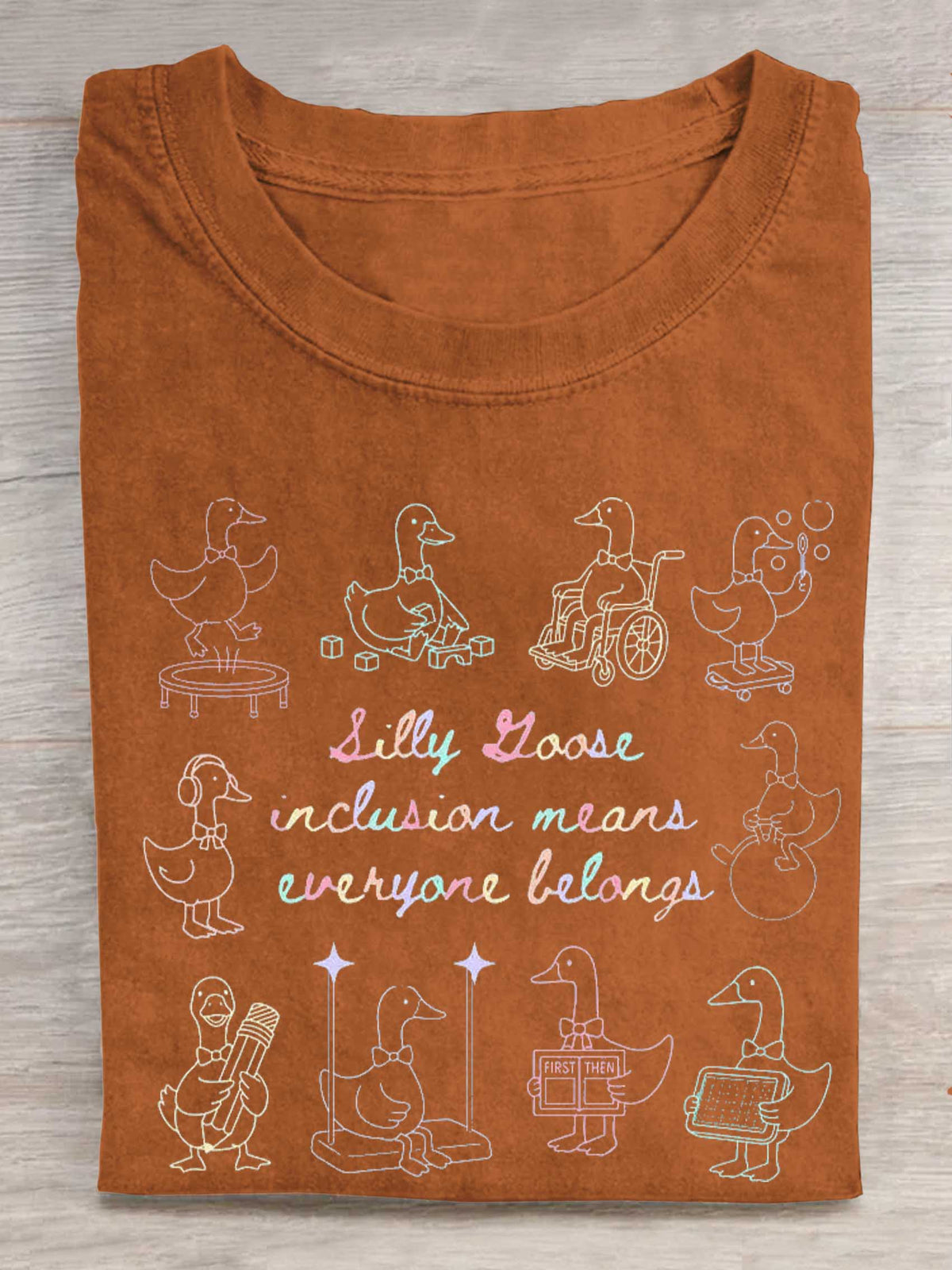 Silly Goose Inclusion Means Everyone Belongs Print T-shirt