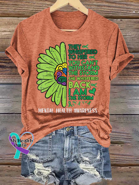 THEY WHISPERED TO HER YOU CAN’T WITHSTAND THE STORM SHE WHISPERED BACK I AM THE STORM Mental Health Awareness T-shirt