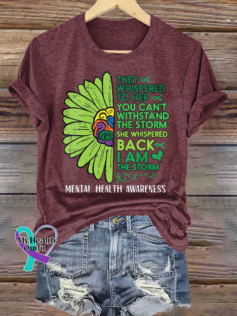 THEY WHISPERED TO HER YOU CAN’T WITHSTAND THE STORM SHE WHISPERED BACK I AM THE STORM Mental Health Awareness T-shirt
