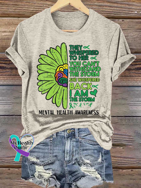 THEY WHISPERED TO HER YOU CAN’T WITHSTAND THE STORM SHE WHISPERED BACK I AM THE STORM Mental Health Awareness T-shirt