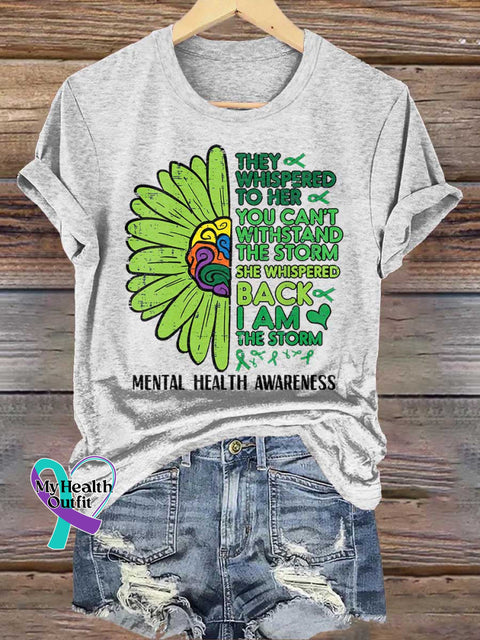 THEY WHISPERED TO HER YOU CAN’T WITHSTAND THE STORM SHE WHISPERED BACK I AM THE STORM Mental Health Awareness T-shirt