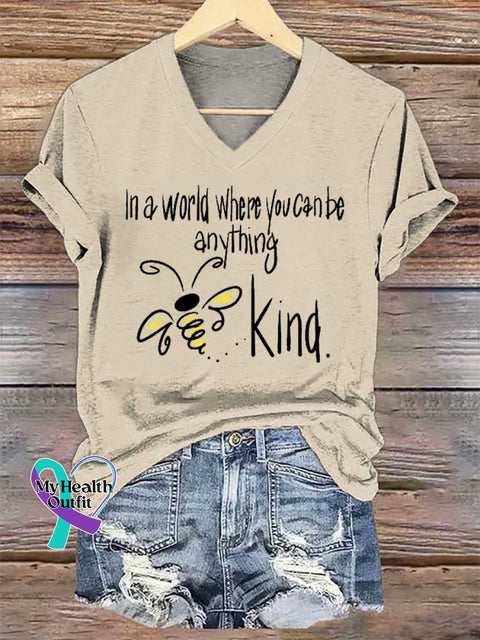 Women’s In A World Where You Can Be Anything Bee Kind V-neck Casual T-Shirt Sand / S