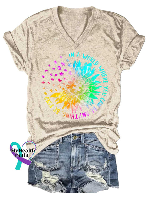 Women’s In A World Where You Can Be Anything Be Kind Autism Awareness V-neck Casual T-Shirt Sand / S