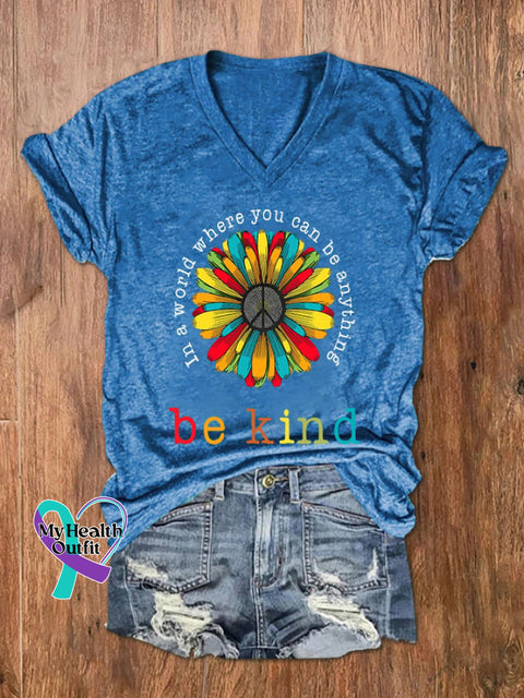 Women’s In A World Where You Can Be Anything Kind Print V-Neck T-Shirt Blue / S