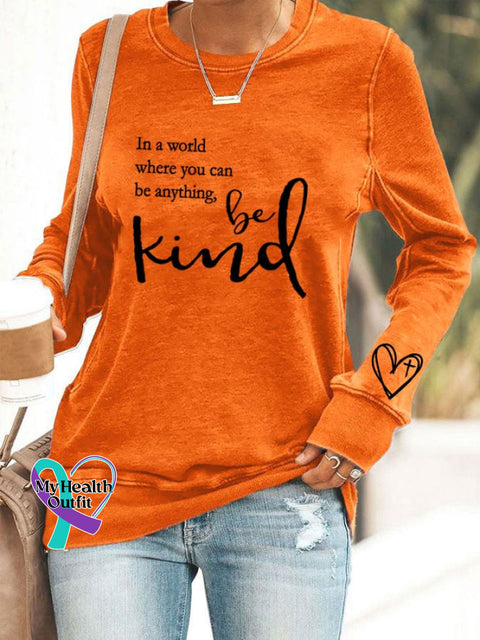 Women’s ’In A World Where You Can Be Anything Kind’ Printed Casual Sweatshirt Orange / S