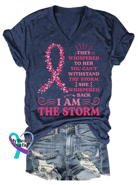 Women’s THEY WHISPERED TO HER YOU CAN’T WITHSTAND THE STORM SHE WHISPERED BACK IAM THE STORM Breast Cancer Awareness V