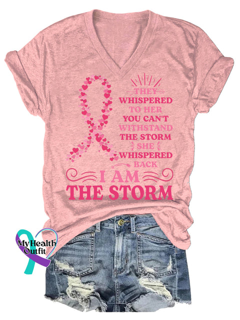 Women’s THEY WHISPERED TO HER YOU CAN’T WITHSTAND THE STORM SHE WHISPERED BACK IAM THE STORM Breast Cancer Awareness V