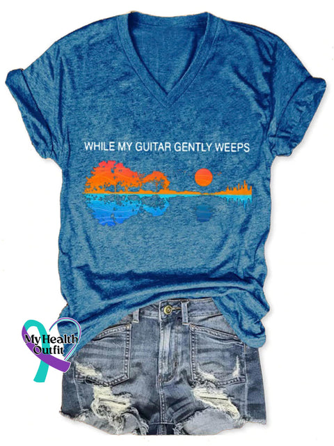 Women’s While Guitar Gently Weeps Art V neck Casual T Shirt Blue / S